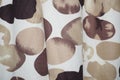 Brown polka dot pattern on white cloth Royalty Free Stock Photo
