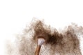 Brown powder dust cloud.Brown particles splattered on white background Royalty Free Stock Photo