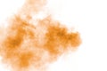 Brown powder dust cloud.Brown particles splattered on white background Royalty Free Stock Photo