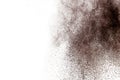 Brown powder dust cloud.Brown particles splattered on white background Royalty Free Stock Photo