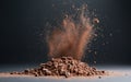 Brown Powder Explosion Against Dark Background Royalty Free Stock Photo