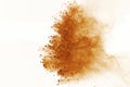 Brown powder explosion isolated on white background. Colored cloud or dust splatted. Royalty Free Stock Photo