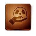 Brown Radioactive in hand icon isolated on white background. Radioactive toxic symbol. Radiation Hazard sign. Wooden