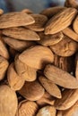 Brown raw almonds pile closeup - Image