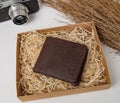 Brown real leather mens wallet in box Royalty Free Stock Photo