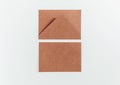 Brown recycle cardboard envelopes on the white background. Craft paper empty envelope template, mock up. Top view Royalty Free Stock Photo