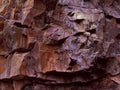Brown red orange rock texture. Rocky formation. Volumetric stone background Royalty Free Stock Photo