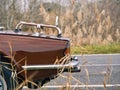 brown retromobile convertible. retro car on a field with tall dry grass