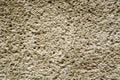 Brown revetment wall putty macro texture Royalty Free Stock Photo