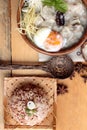 Brown rice porridge put pork and brown rice with soft-boiled egg Royalty Free Stock Photo