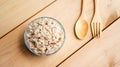 Brown rice spoon and fork on a wooden table Royalty Free Stock Photo