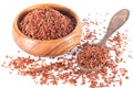 Brown rice on wooden bowl with spoon