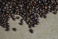 Brown roasted coffee beans, seed on woodenbackground
