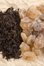 Brown rock candy sugar and black tea Royalty Free Stock Photo