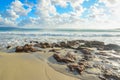 Brown rocks in Le Bombarde beach Royalty Free Stock Photo