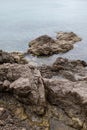 Brown rocks on the shore