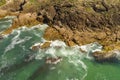 The brown Rocks and Tasman Sea at Birubi Point in regional Australia