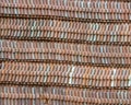 Brown roof tiles lined up in a long line Royalty Free Stock Photo