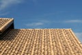 Brown Roof Tiling with Blue Sky Background