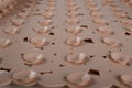 Brown rubber mat for bath with pattern as background, inverse Royalty Free Stock Photo