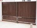 Brown rust dark portal steel classic retro design metal gate of vintage style house