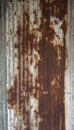 Brown rusty stain on corrugated zinc panel outdoor