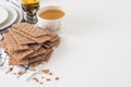 Brown rye crispy bread (Swedish crackers) on piece of cloth with