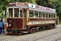 Brown 1920s Single Deck Gateshead Tram with adverts for Binns and Newcastle Brown Ale.