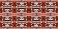 Brown safari animal print patchwork stripe seamless border pattern. Natural quilt clash style in brown printed fabric