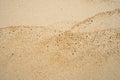 Brown sand texture background from fine sand with natural line wave. Royalty Free Stock Photo