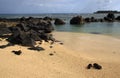 Brown sandals on a deserted beach Royalty Free Stock Photo