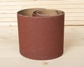 Brown sandpaper on wooden planks Royalty Free Stock Photo