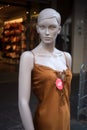 brown satin nighty on mannequin at the market in the street Royalty Free Stock Photo