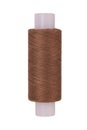 Brown sewing thread reel on white isolated background