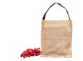 Brown shopping sack bag and cherry fruit isolated on white background