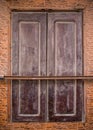 Brown shutter of a moroccan building