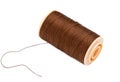 Brown Silk Cotton Thread On Plastic Reel.