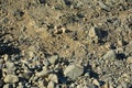 Brown soil dirt with stones and pebbles