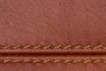 Brown stitched leather close up