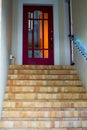 Brown stone stairs in front door entrace or front yard of house or home in the city neighorbood or in urban part of