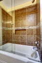 Brown stone tile shower with close up Royalty Free Stock Photo