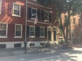 Brown stone town-homes in historic Washington Square West, Philadelphia, PA with shade