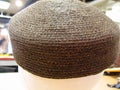 Brown straw pillbox hat