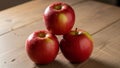 Brown with a subtle grain texture. The apples form a triangular Royalty Free Stock Photo