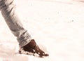 Brown suede Desert Boots covered in snow