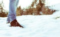 Brown suede Desert Boots covered in snow