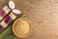 Brown sugar and cane on the table top view