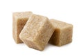 Brown sugar cubes close-up on a white. Isolated Royalty Free Stock Photo