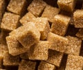 Brown sugar cubes in the paper package. Top view Royalty Free Stock Photo