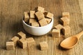 Brown sugar cubes in a white bowl Royalty Free Stock Photo